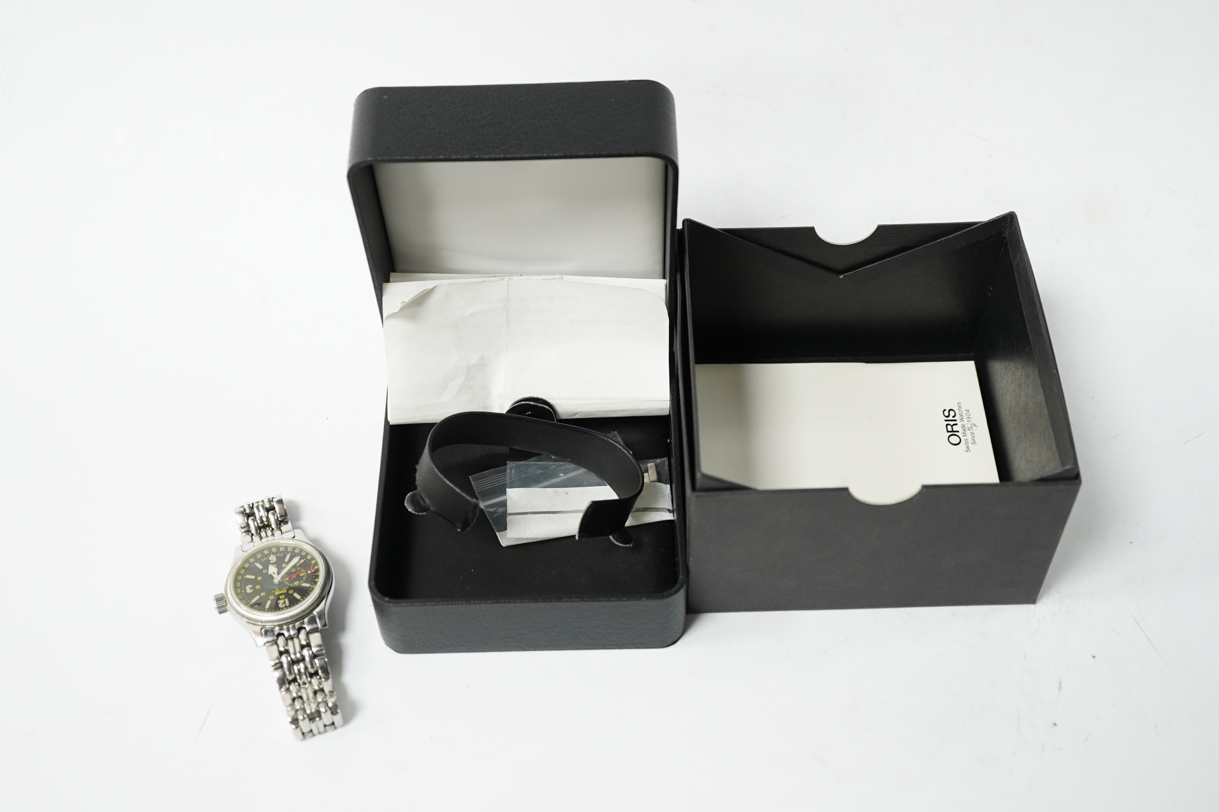 A gentleman's recent stainless steel Oris 640 Automatic wrist watch, with black dial, subsidiary seconds and Arabic and baton numerals, case diameter 36mm, on a stainless steel Oris bracelet, with receipt, box and papers
